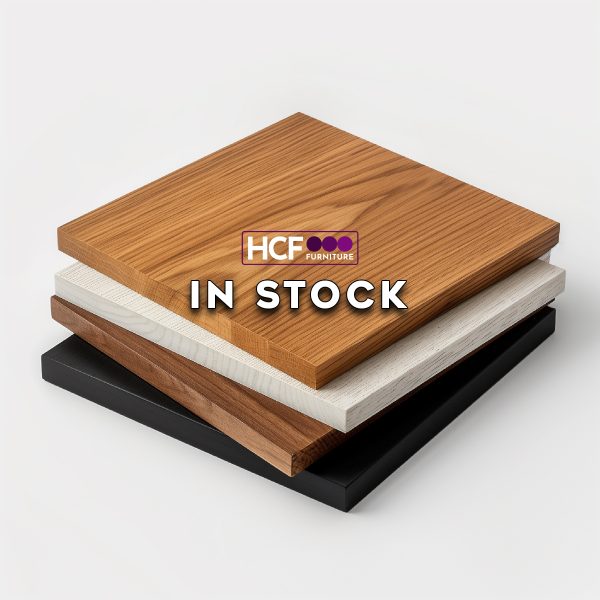 Square MFC laminate table tops stacked in various colour choices