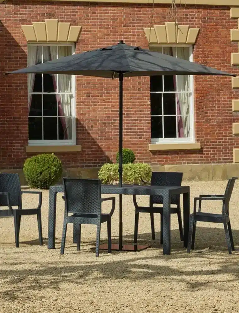 Large outdoor parasol providing shade for restaurant or bar terrace seating.
