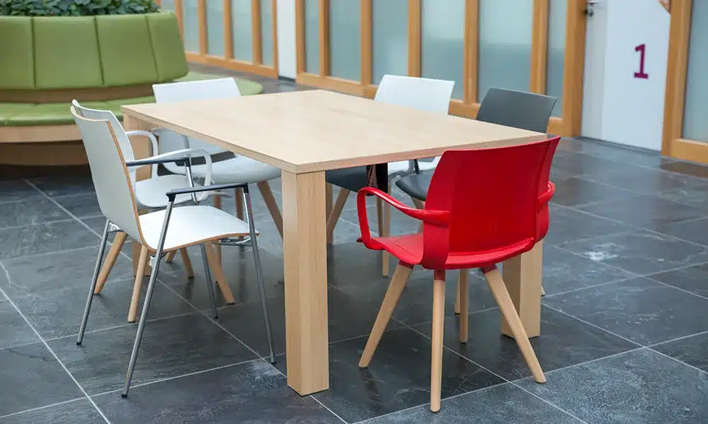 Wood and resin office chairs built for durability inside a UK council office