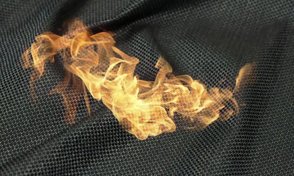 A piece of fabric with flames coming out, showing crib 5 quality