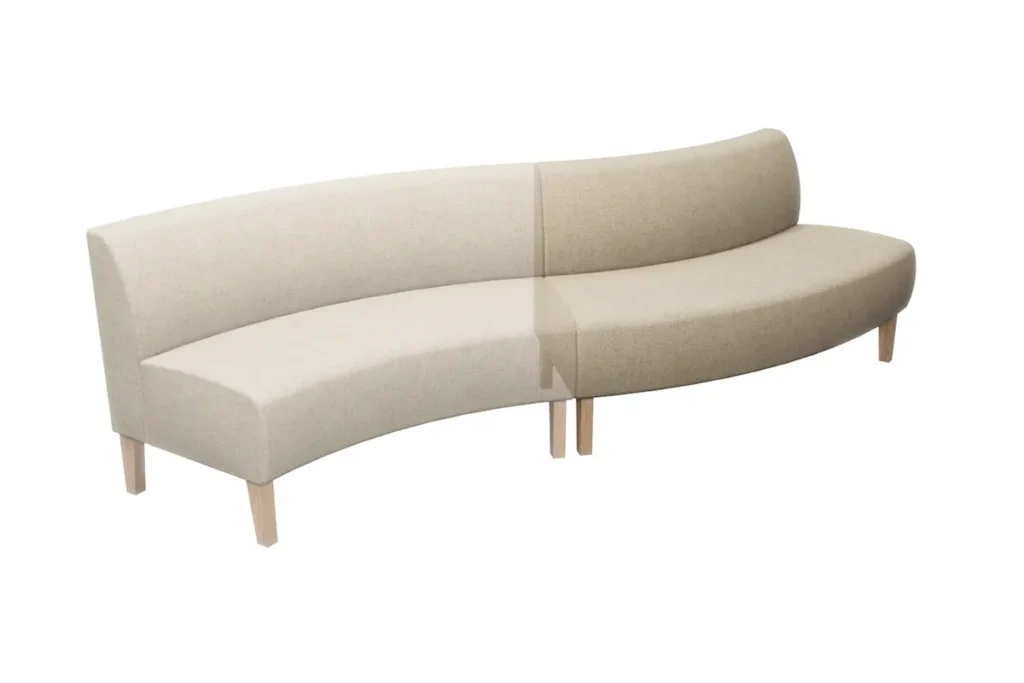 Curved plain bench seating made from round booth units set at 45 degrees to create a flowing corner arrangement.