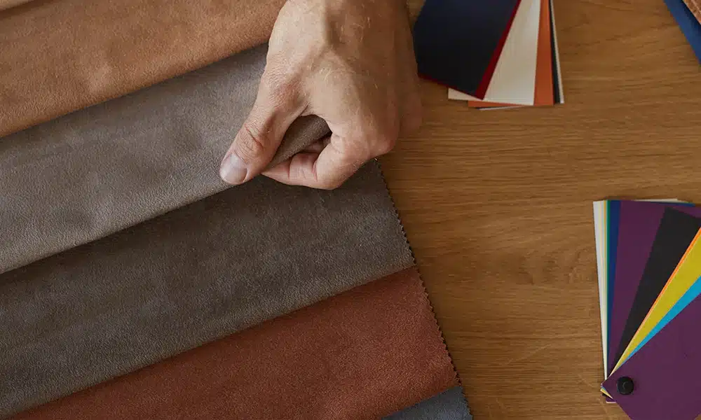 Faux leather swatches on a table - commercial fabric for booth seating