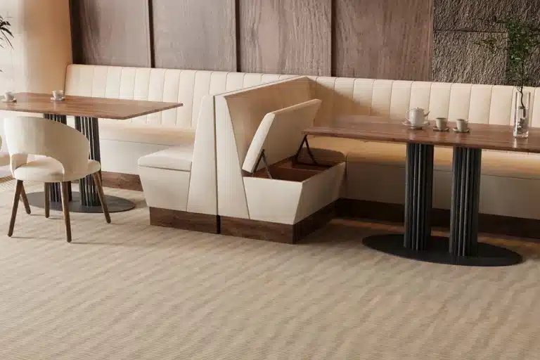 Haven fluted U shape set installed in a restaurant with table and accessories.