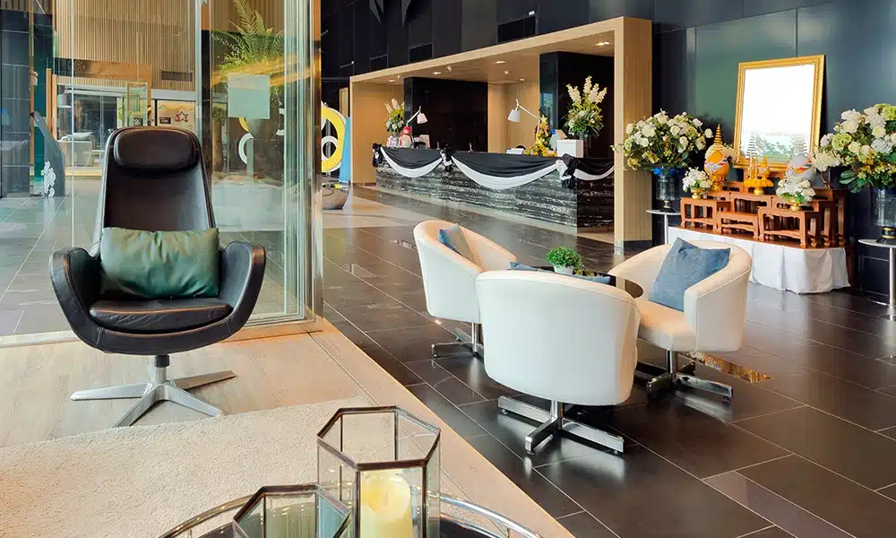 hotel guest reception area with soft seating and lounging chairs