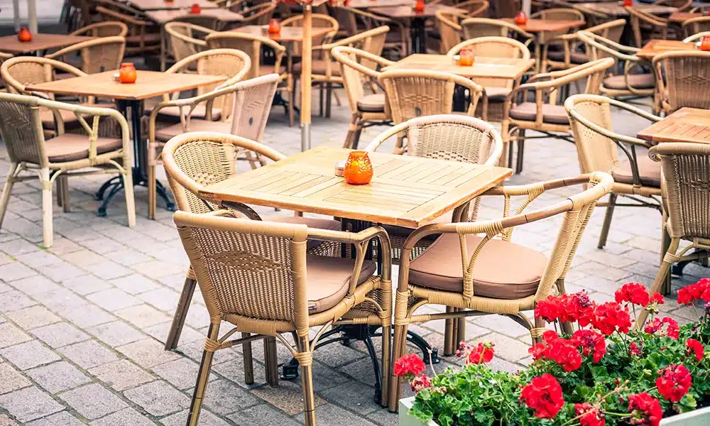 Rope weave chairs with aluminium frames outside a restuarant cafe - commercial dining furniture