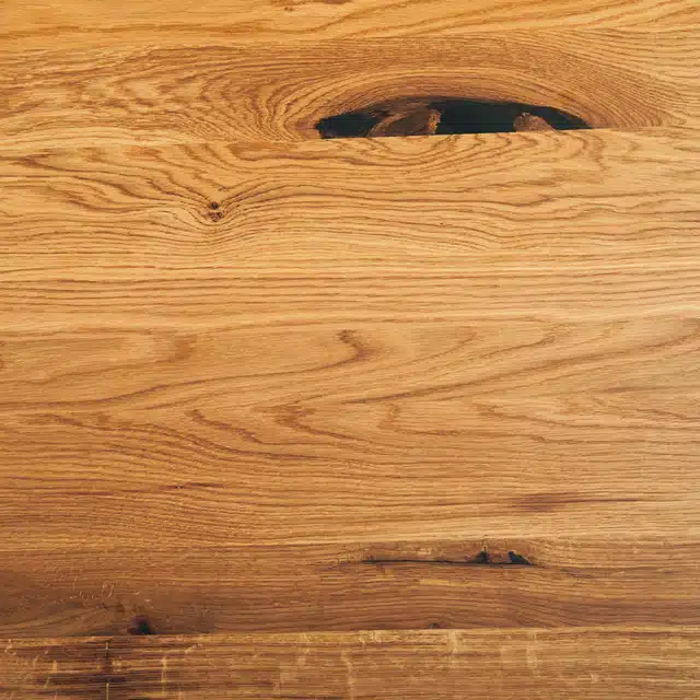 Close up of a solid wood character oak table top